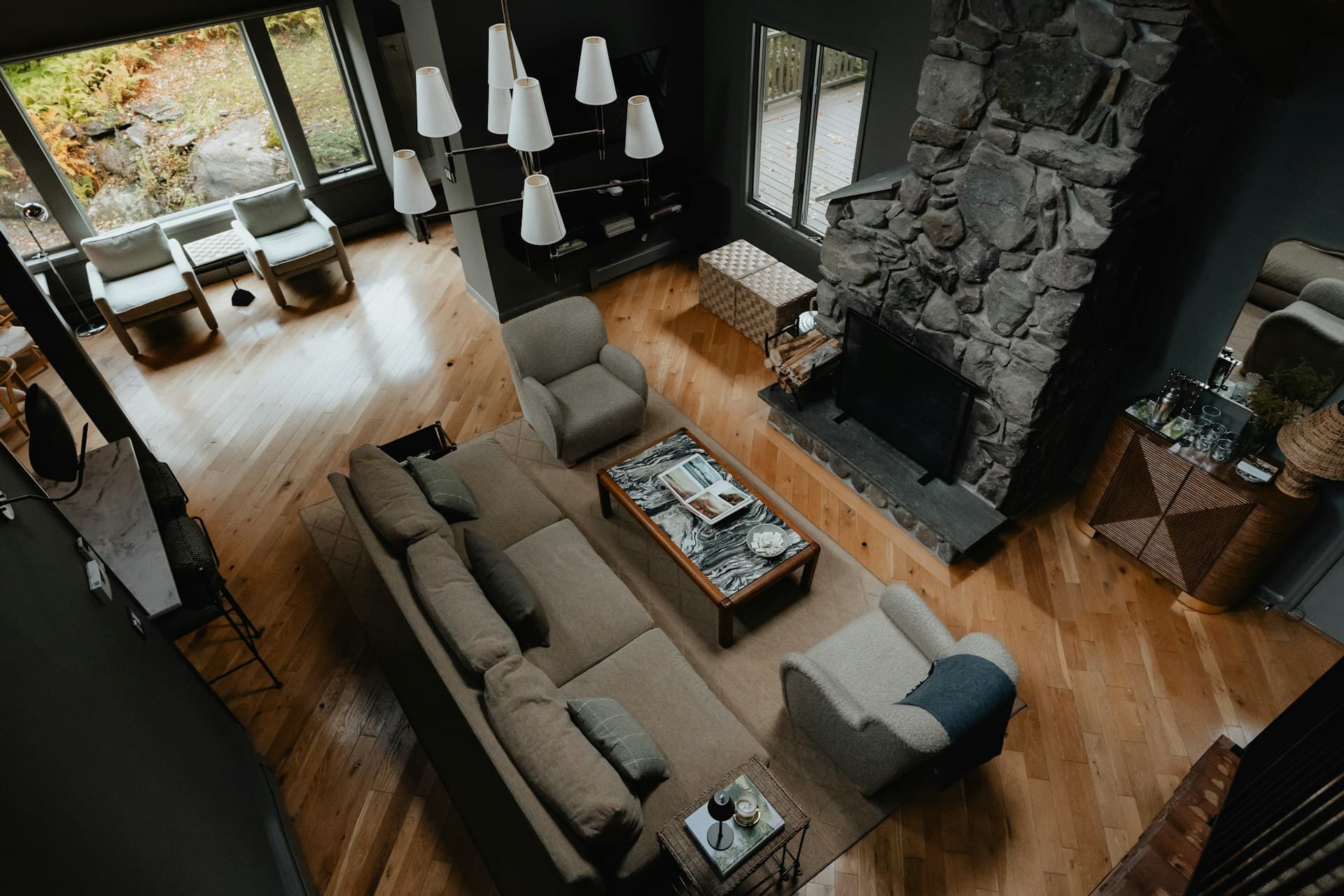Stylish living room interior with stone fireplace